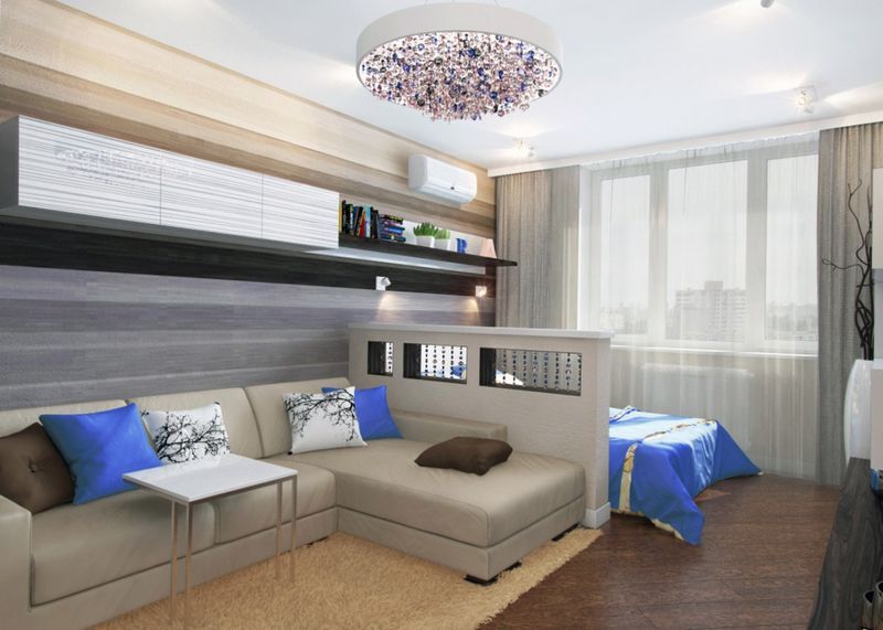 Design Aufteilung des Wohn- und Schlafzimmers in einer kleinen Wohnung