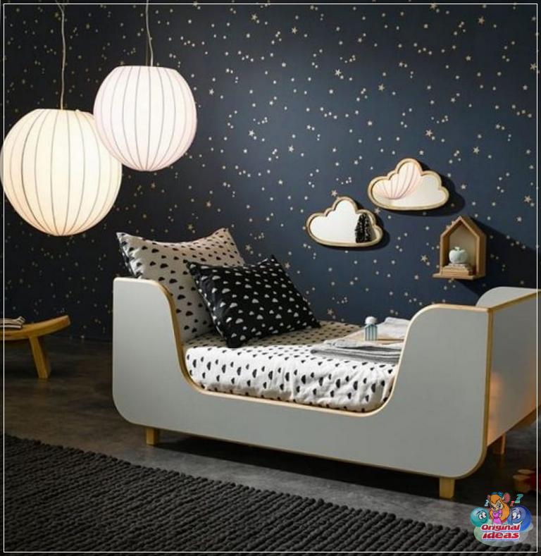 Do not be afraid of dark walls in the nursery, properly selected lighting and decor neutralizes its undesirable consequences