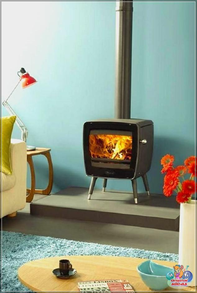 A cheerful fireplace in the shape of an old TV will perfectly fit into a retro interior