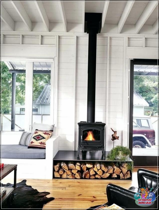 It is possible to favorably highlight the fireplace against a white wall by choosing a contrasting black color for it